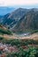 Gorge with stones, high in mountains, view from top. Vertical photo. Carpathian mountains