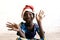 Gorgeous African Schoolgirl posing for Christmas with Hat and Hands Open