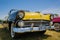 Gorgeous amazing closeup front view of classic vintage car on sunny day