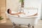 Gorgeous beautiful female takes a bath. Relax in a bubble bath