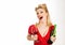 Gorgeous blonde pin up woman with glass of red wine. Glamour pinup woman in red dress on a white background. She pose