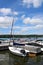 Gorgeous blue skies and puffy clouds over boating docks, Cazenovia Lake, summer, 2020