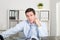 Gorgeous businessman sitting at his worktable