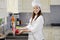 Gorgeous chef washing vegetables