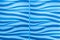 Gorgeous closeup detailed view of interior luxury decorative wall,smooth wavy blue background