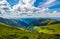 Gorgeous cloudscape over the grassy hillside