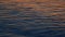 Gorgeous Contrast Between Warm Shades Of Sunset. Golden Colored Calm Sea Water At Sunset. Close up.