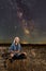 Gorgeous cowgirl under Milky Way