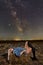 Gorgeous cowgirl under Milky Way