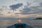 Gorgeous dawn clouds and sunrise on Georgian bay water in a boat