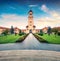 Gorgeous evening view of bell tower of Reunification Cathedral, Fortified churches inside Alba Carolina Fortress. Splendid sunset