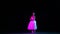 Gorgeous female dancer in ballet dress dancing solo part on dark stage in neon light. Concept of art, beauty, theater