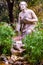 Gorgeous fountain of Moses surrounded by growing juicy plants in Park Borghese in Rome, Italy