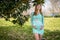 A Gorgeous Glowing Pregnant Woman Poses In An Outdoor Environment