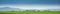 Gorgeous greens and blues in the landscape - panorama perspective with copy space