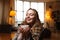 Gorgeous happy woman drinks coffee at a cafe background. Covered cozy plaid.