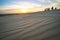 gorgeous landscape of Asian desert. Dawn over the sand dunes in MUI ne Vietnam. Sunset over the horizon. white and red dunes