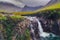 Gorgeous landscape view of Cuillin hills with river stream and waterfall, Scotland