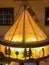 Gorgeous light fixture hanging in rustic lodge