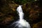 Gorgeous moody shot of Skelwith Force waterfall in the Lake District in Cumbria