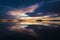 Gorgeous morning light over lake Malaren in Sweden, Reflection in calm water sky with dramatic colorful clouds