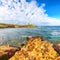 Gorgeous morning view of Piscinni bay with turquoise sea and famous coastal tower of Piscinni