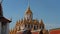 Gorgeous multi-tiered Loha Prasat rises above temple`s roofs