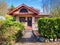 Gorgeous northwest home with red trim.