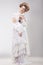 Gorgeous Outre Female in Lacy White Dress with Flowers
