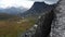 Gorgeous panorama - rainy mountains and fields, lake. Hiking in Siberia in summer. Journey through the taiga of Russia