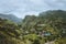 Gorgeous panorama view of a fertile Paul valley. Agriculture terraces of sugarcane in vertical valley sides, dwellings