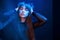 Gorgeous person. Studio shot in dark studio with neon light. Portrait of young girl