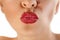 Gorgeous red lips pucker up for kiss