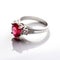 Gorgeous ring features a beautiful ruby surrounded by dazzling diamonds.