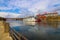 The gorgeous rippling waters of the Cumberland river with a white and red steam boat sailing on the water