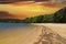 A gorgeous sandy beach on the banks of the rippling lake at sunset with powerful clouds at Dallas Landing Park