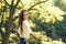 Gorgeous school age girl in autumn forest