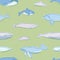 Gorgeous seamless pattern with aquatic animals or marine mammals hand drawn on green background - blue, humpback, beluga