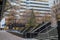 A gorgeous shot of the cityscape in downtown Charlotte with gorgeous autumn trees and black marble waterfall