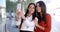 Gorgeous stylish young women pose for a selfie