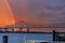 a gorgeous summer landscape along the Mississippi River with the Crescent City Connection bridge over the water