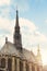 Gorgeous sunny day over Notre Dame cathedral with puffy clouds, Paris, France