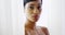 Gorgeous topless black woman looking at camera