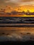 Gorgeous vertical shot of the sea at evening with a stunning cloudscape