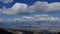 Gorgeous view of the chain of mountains blue sky and white clouds