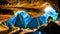 A Gorgeous View of Cliff Cave Waterfall amidst Mountain Sunshine