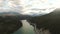 Gorgeous View of Glacial Lake and Scenic Road at Sunset