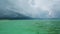 Gorgeous view of Indian Ocean, Maldives.  Huge black white clouds and heavy rainfall on a distance.