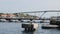 Gorgeous view of the moving pontoon Queen Emma Bridge across St. Anna Bay.