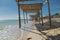 Gorgeous view of the ocean and decorated beach walkway with people in background at Cuban island